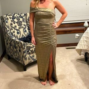 Brand new, never worn, tags still on women’s multi color shimmer-gold dress.